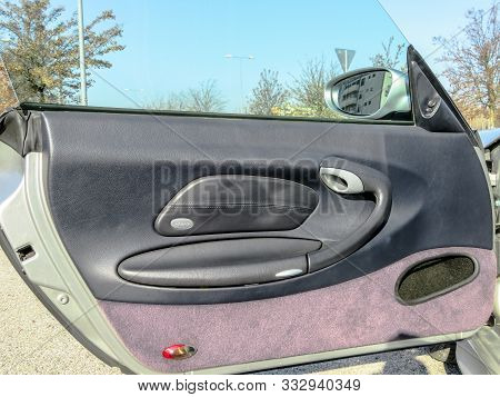 Bologna, Italy - February 6, 2019: Open Door Close Up Of The Porsche 911 Sport Car Or Porsche Carrer