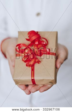 Small Gift In The Hands Of Little Girl Present For Christmas, Valentine Day, New Year, Birthday. Top