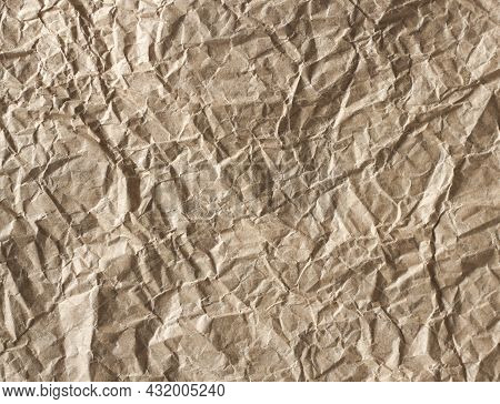 Crumpled Craft Paper Background Texture. Copy Space