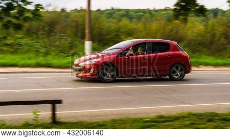 Moscow, Russia - August 2021: Peugeot 308 Five Door Hatchback Is Driving At High Speed On Country Ro