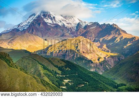 Scenic View At Gudauri View Point Monument With Paragliding Parachutes