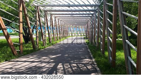 Cycle Lane-bike Path With A Wooden Fence, In Summer
