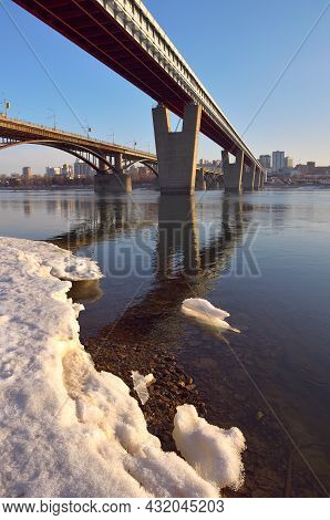 Metro-most And Automobile Bridge Over The Great Siberian River In Novosibirsk. Snow And Ice On The B