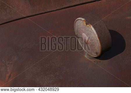 Close-up Of A Rotten Boundary Light With Chipped Paint