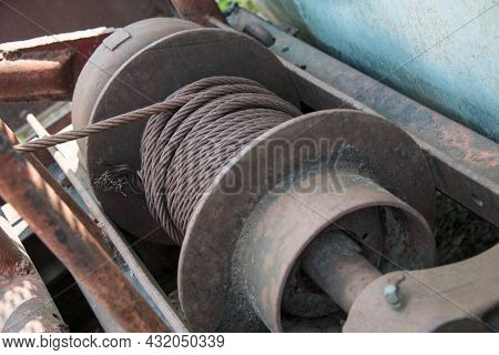 Close-up Of A Rusty Winch With Braided Steel Rope