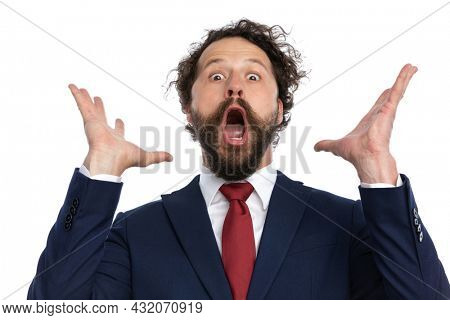 handsome businessman having his mind blown against white background