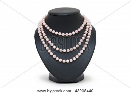 Pearl Necklace On Black Mannequin Isolated