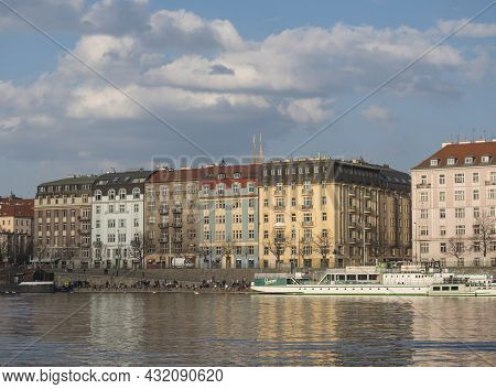 Prague, Czech Republic, March 26, 2021: View Of Rasinovo Nabrezi Riverbank From Vltava River With Cr