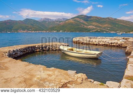Beautiful Mediterranean Landscape With Fishing Boat In Small Harbor. Montenegro, Adriatic Sea, Bay O