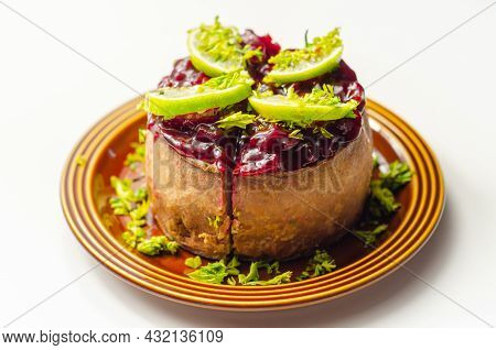 Seasoned British Pork, Wrapped In Crisp, Flavoursome Pastry Served With  Beetroot And Orange Chutney