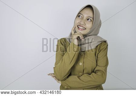 Happy Government Worker Women Have Thinking Gesture. Pns Wearing Khaki Uniform.