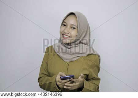 Happy Government Worker Women When Using A Smartphone. Pns Wearing Khaki Uniform.