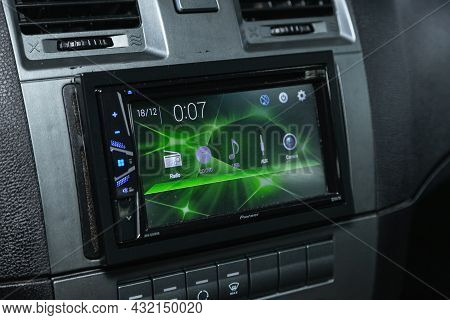 Novosibirsk, Russia - July 15, 2021: Uaz Patriot, A Close Up On A Black Panel With Radio,  Player An