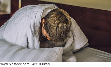 Close-up Front View Top Of Head Child Caucasian Boy Grey Hair Stick Out From White Blanket In Bedroo
