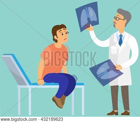 Male Physician Or Radiologist Demonstrating X-ray Of Rib Cage To Scared Patient And Informing About 