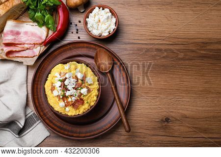Delicious Traditional Banosh Served On Wooden Table, Flat Lay. Space For Text
