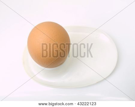 Soft Boiled Egg On A Used Plastic Plate Isolated On White Background