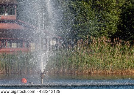 Fountain In Lake Aluksne Near Pilssala On A Sunny Summer Afternoon, Aluksne, Vidzeme, Latvia
