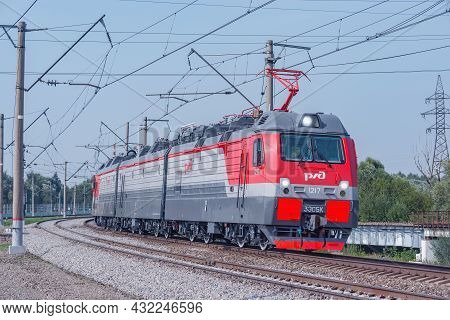 Moscow, Russia - August 27, 2021: Freight Modern Electric Locomotive Approches To The Station.