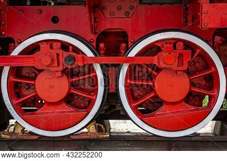 Old Steam Locomotive Wheels Painted In Red