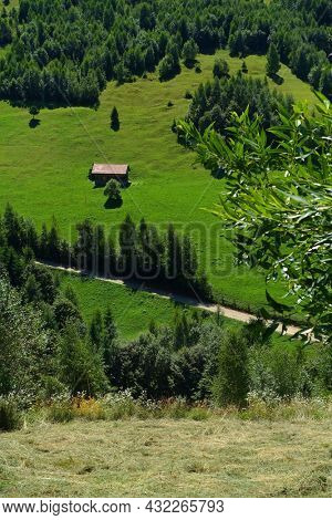  Summer landscape in the Carpathians, Pestera Village, Romania, Europe                            