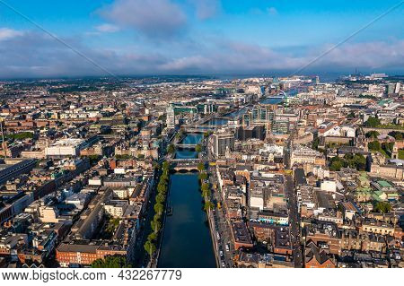 Establisher Shot Of Dublin Skyline With River Flowing With Bridge Connecting Two Sides Of Street Sur