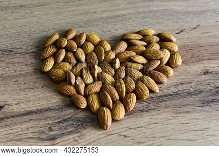 Almonds Lying On The Table In The Form Of A Heart.