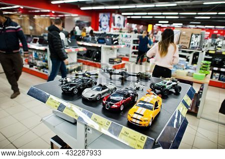 Kyiv, Ukraine - November 23, 2018: Toy Copy Cars In Store. Bugatti Veyron, Carrera Gt, Ford Mustang,