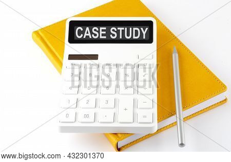 Calculator With The Text Case Study On The Display On The Notebook