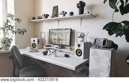 General View Home Workplace Of Gamer With Computer And Gamepad.