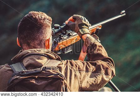 Hunting Period. Male With A Gun. Close Up. Hunter With Hunting Gun And Hunting Form To Hunt. Hunter 