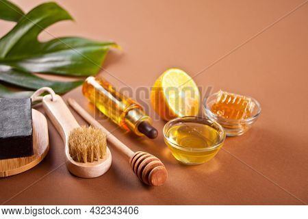 Bath And Beauty Spa Personal Hugiene Accessories On The Brown Background
