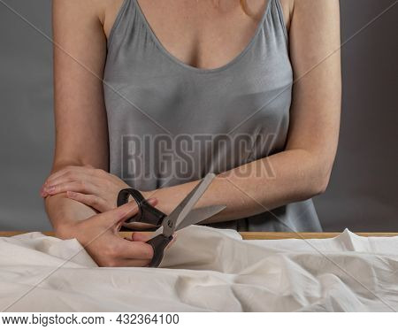 Sewing Scissors In Tailor Hands, Strating Work With Cotton Material.