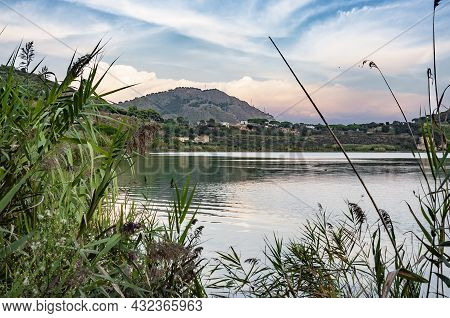 View Of The Averno Lake In Naples, Italy, At Sunset