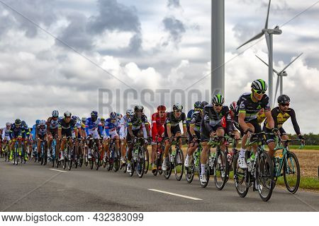 Le Gault-saint-denis, France - October 08, 2017: The Peloton Riding On A Road In The Plain With Wind