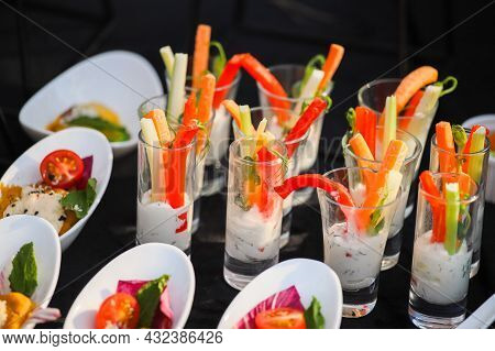 Vegetables In Sauce On A Buffet Table, Sweet Paprika And Carrots