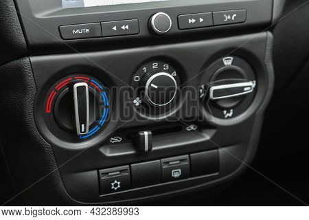 Novosibirsk, Russia - July 19, 2021: Lada Granta ,  Black Detail With The Air Conditioning Button