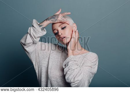 Millenial Young Woman With Short Blonde Hair Portrait Doing Face Yoga Self Facebuilding Massage For 