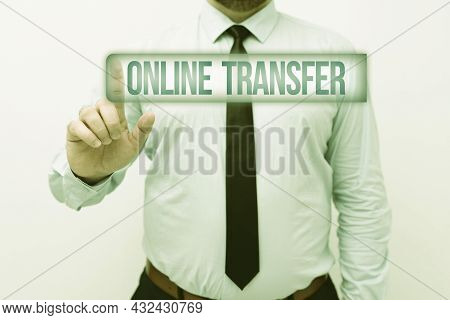 Hand Writing Sign Online Transfer. Business Concept Authorizes A Fund Transfer Over An Electronic Fu