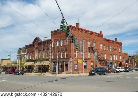 Potsdam, Ny, Usa - Apr. 27, 2017: Historic Sandstone And Brick Commercial Buildings With Italianate 