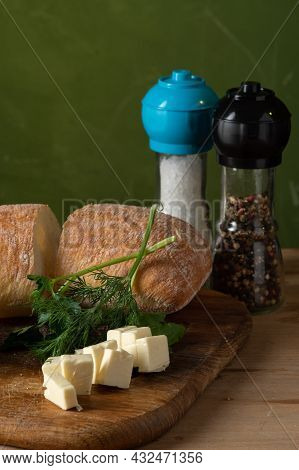Sliced Cheese And Bread. Bread With Dill And Cheese. Ciabatta With Spices. Vertical Frame.