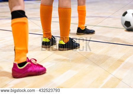 Boys In Soccer Clothes With Soccer Futsal Ball. Kid On Indoor Soccer Training. Child Playing Futsal 