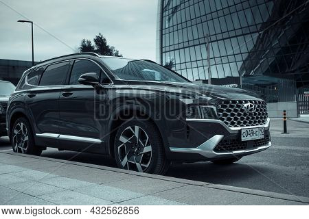 Hyundai Santa Fe Phev Parked On The Street In Moscow. Black Suv Car In Front Of Office Building. Mos