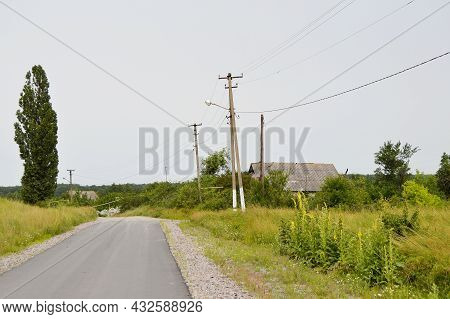 Beautiful Empty Asphalt Road In Countryside On Colored Background