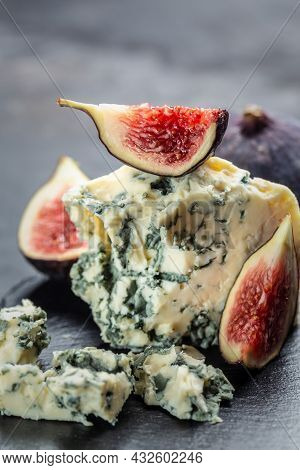 Blue Cheese And Sweet Fruit Figs. Blue Cheese Gorgonzola Picante With Blue Mold From North Of Italy.