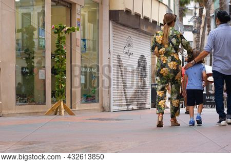 Málaga, Spain - June 19, 2021: People Walking In The Historic Center Of Malaga In Spain