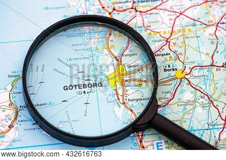 Map Of Gothenburg In Sweden Through Magnifying Glass, Concept Of Planning The Travel Itinerary
