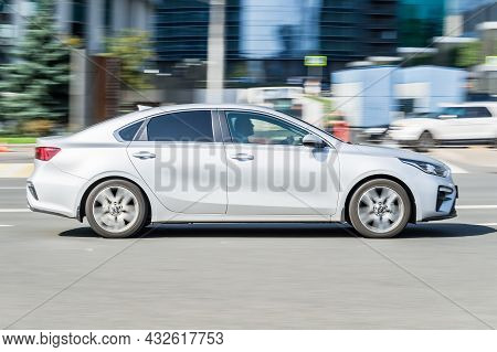 Moscow, Russia - August 2021: Kia Forte In Fast Motion On City Street. Speeding In The City Is Not P