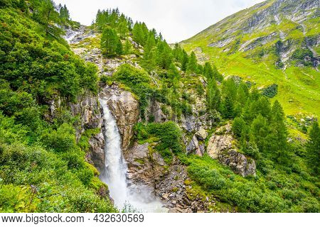 Wild Alpine Waterfall On Schlatenbach Mountain Stream. Gschloesstal Valley, Hohe Tauern National Par