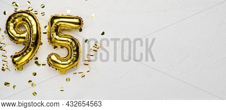 Golden Foil Balloon Number Ninety Five. Birthday Or Anniversary Card With The Inscription 95. Gray C